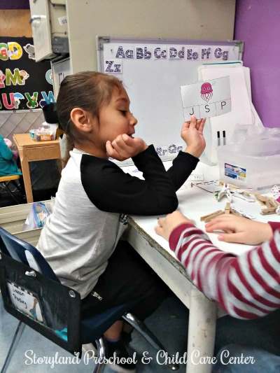 Children are learning to recognize letters and beginning letter sounds.